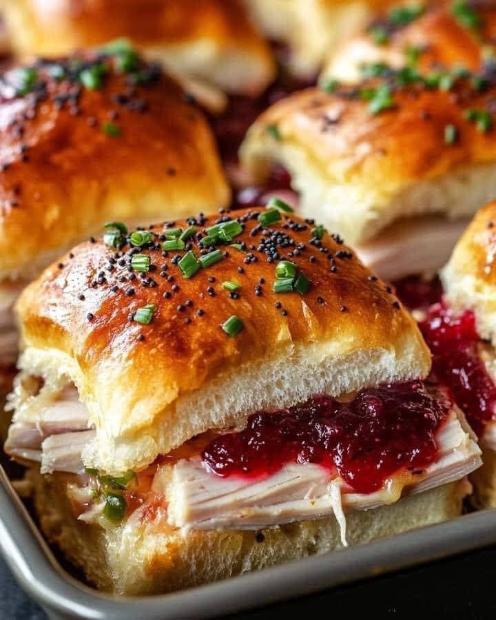 Baked Cranberry Turkey Sliders with Havarti & Poppy Seed Topping