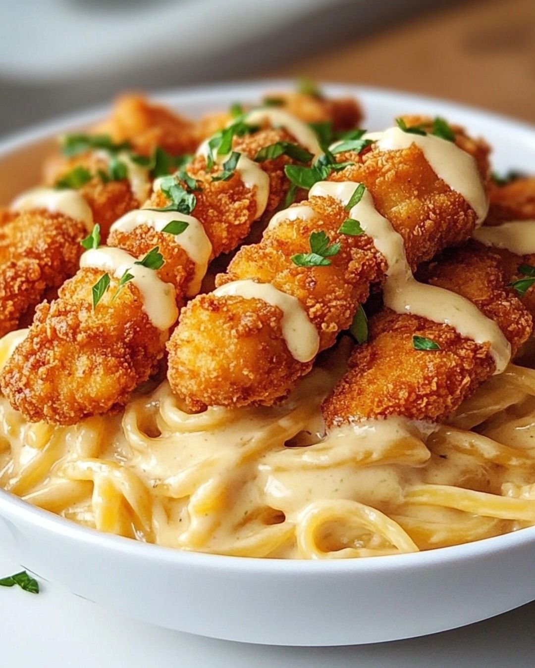 Creamy Alfredo Pasta with Crispy Chicken Tenders Recipe